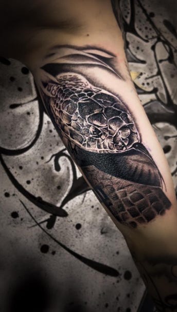 Schlangen Tattoo