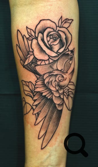 Vogel Blumen Tattoo